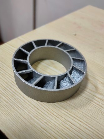 Printed metal swirler with curved vanes